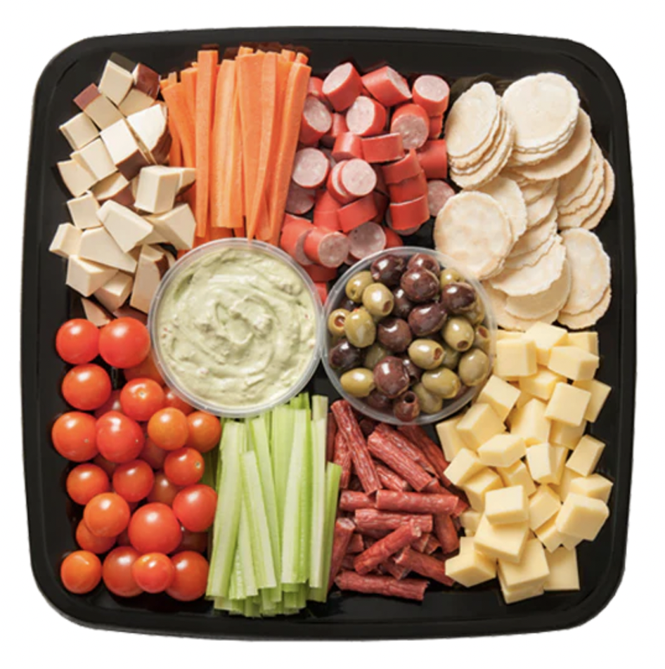 Assortment of cheeses, crackers and condiments on a platter